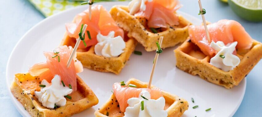 Mini waffles with smoked salmon and lime whipped cream