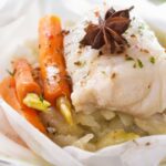 Sea bass papillote with star anise, fennel and carrots