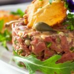 Duck tartare with fried potatoes