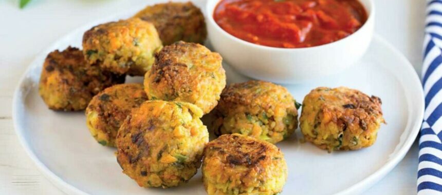 Spicy quinoa balls with vegetables, tomato sauce with herbs