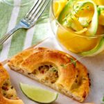 Creole crab tart with avocado and green mango salad