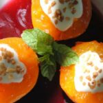 Roasted apricots stuffed with brocciu and cherry coulis