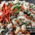 Beanotto with spinach, chorizo and goat cheese