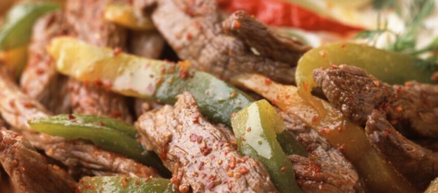 Beef sautéed with peppers and sesame seeds