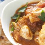 Monkfish curry with coconut milk and peppers