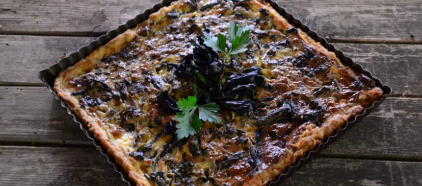 Savory pie with mushrooms Trumpet of Death