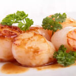 Scallops with lobster bisque sauce