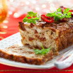 Christmas cake with dried tomatoes and goat cheese