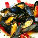 Grilled mussels, piquillo peppers and Espelette pepper