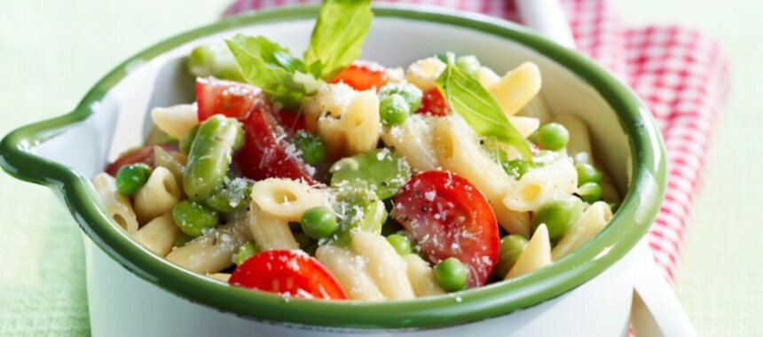 One pot pasta of penne, broad beans and peas