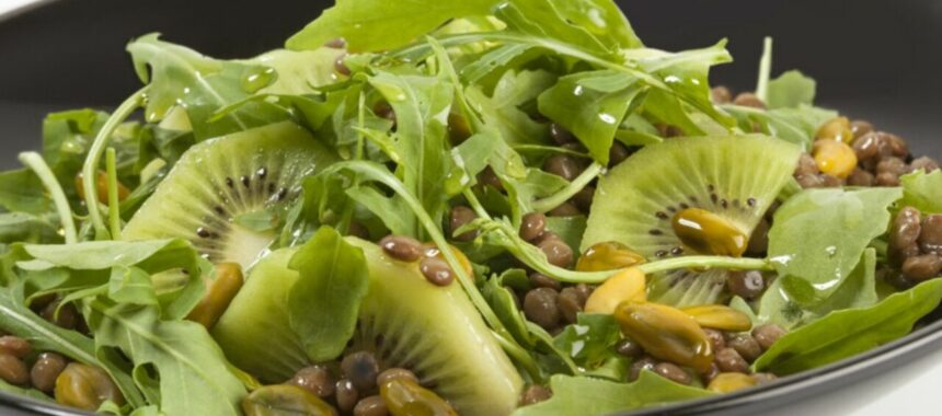 Lentil, kiwi, arugula and green pistachio salad