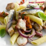 Penne with anchovies, squid and tuna