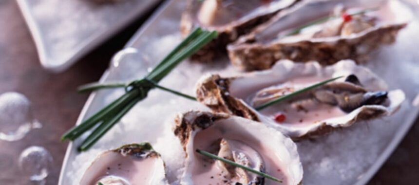 Poached oysters with pink peppercorns, champagne sauce