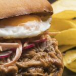 Burger with pulled pork and fried egg