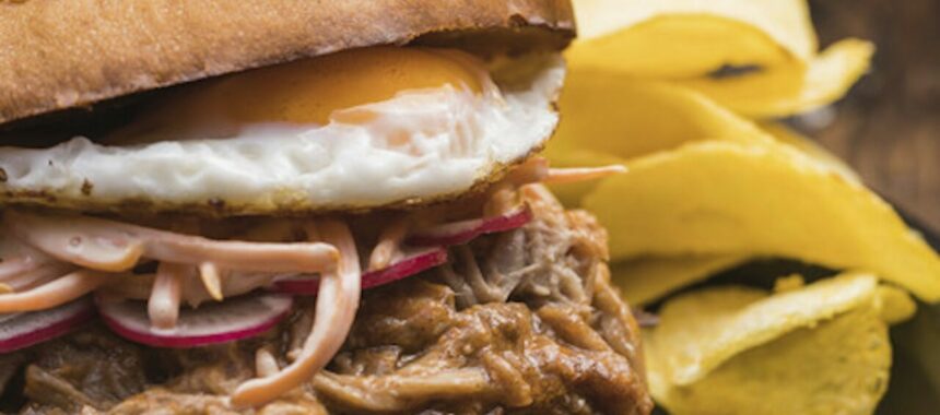 Burger with pulled pork and fried egg