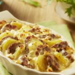 Potato and sausage gratin with chaource