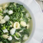 Minestrone with orecchiettes, peas and basil