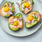 Baked avocado with egg and salmon