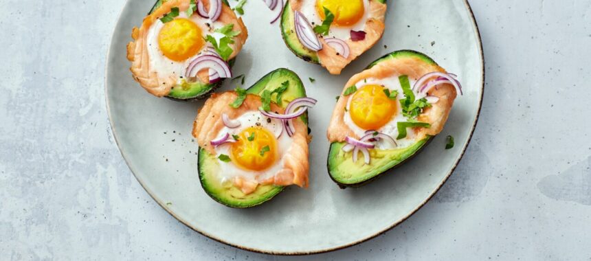Baked avocado with egg and salmon