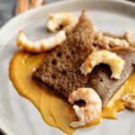 Buckwheat pancakes with crab and langoustines