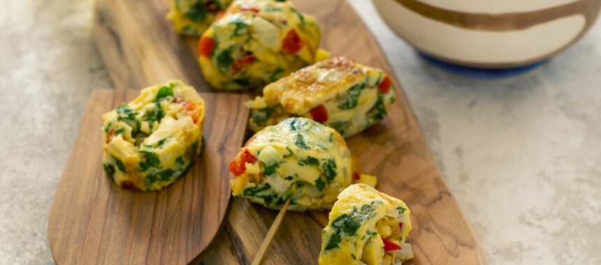 Rolled omelet with herbs and tomatoes