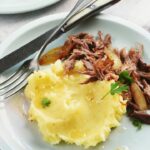 Duck parmentier with onions