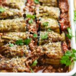 Eggplant rolls with tomato, ground beef and parmesan
