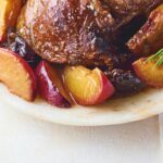 Tagine of lamb shank confit with nectarines and rosemary