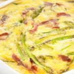 Clafoutis with asparagus and raw ham