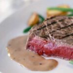 Rib steaks with anchovy sauce