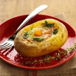 Egg casserole in a potato shell with sorrel and salmon