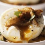 Poached eggs with artichokes