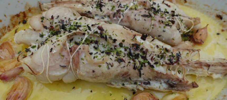 Roasted monkfish tail with garlic cloves