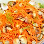 Spaghettis au jus de carottes et aux coques